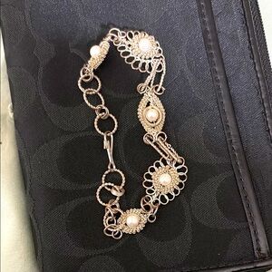 Gold and Cream Vintage-Inspired Bracelet with Intricate Detailing